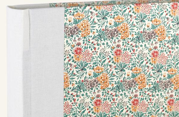 Yellow photo album, small floral decoration